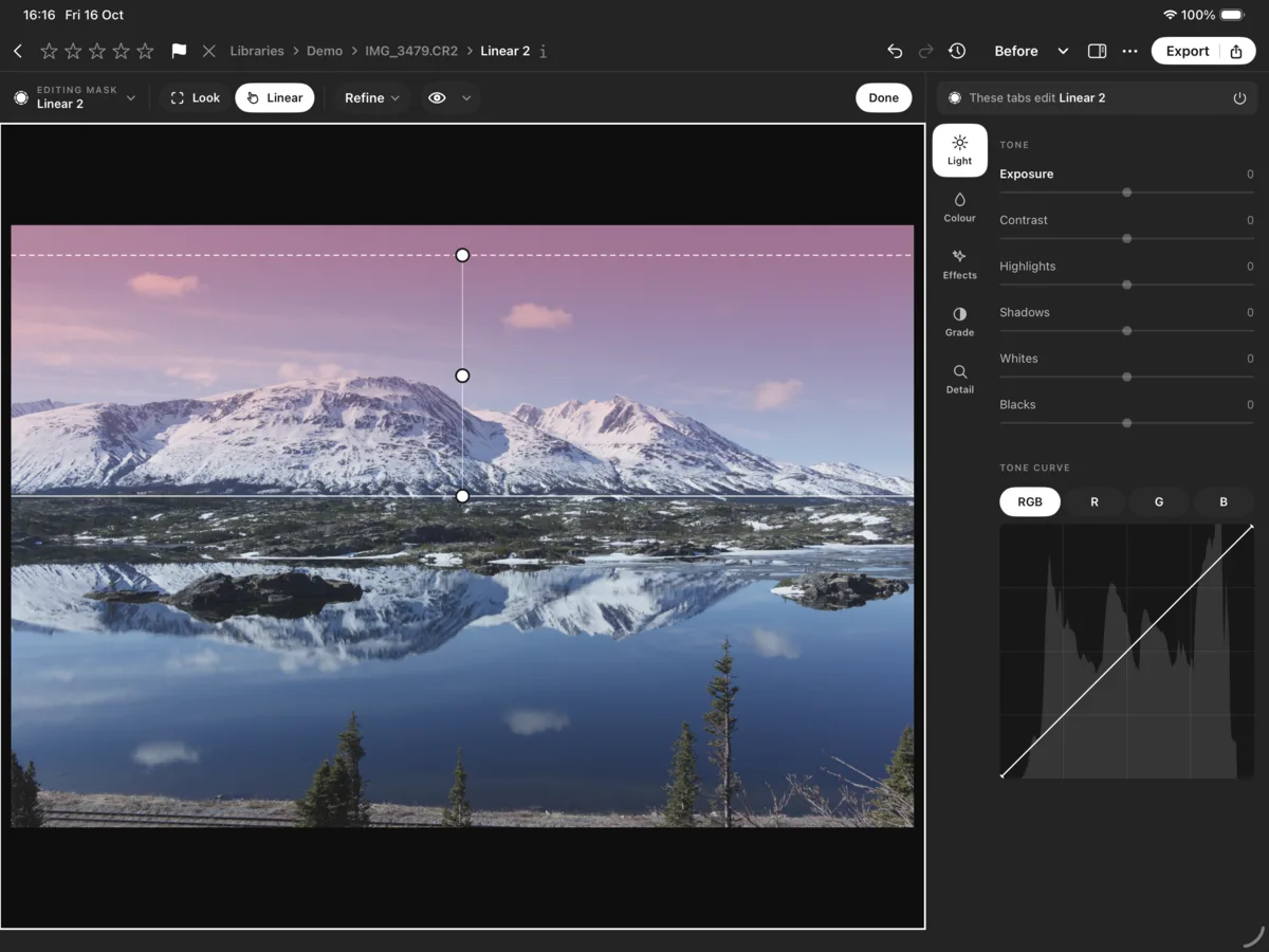 Numa on iPad: a linear mask tinting the sky pink above a mountain lake