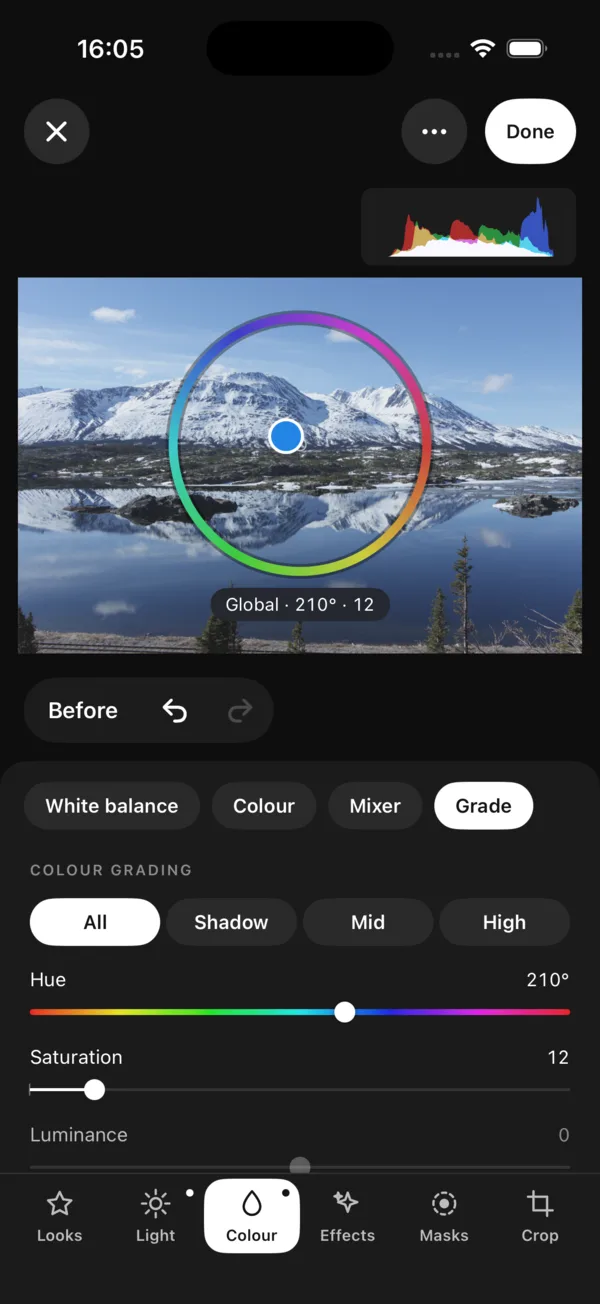 Numa on iPhone: the colour grading wheel above the Hue and Saturation sliders